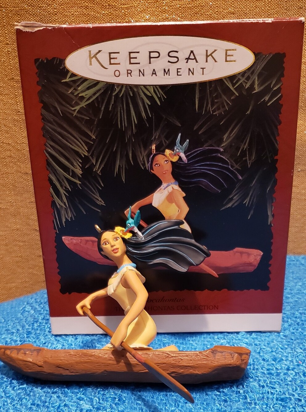 Hallmark Yellow and Brown Pocahontas In A Canoe Ornament